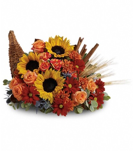 Classic Sunflower Cornucopia. An arrangement by McKenzie Floral.