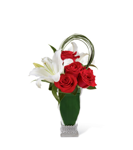 The FTD® Pure Passion™ Bouquet - Standard. An arrangement by Sueppel's Flowers.