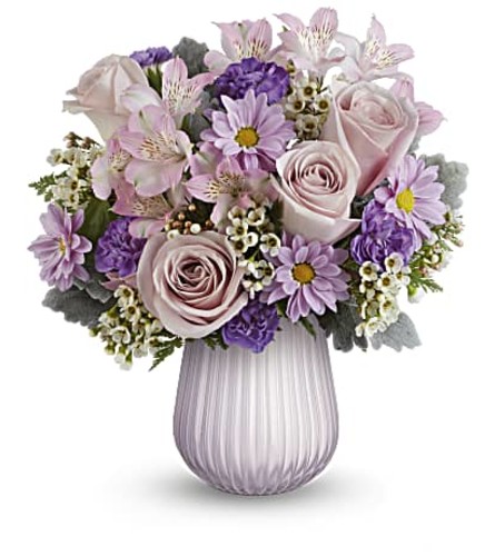 The Teleflora's Playful Love Bouquet - Deluxe. An arrangement by Marivel's Florist and Gifts.