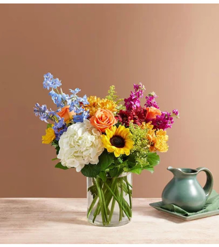 Fall Devotion™ Bouquet - Standard. An arrangement by Lovingly Charlotte.