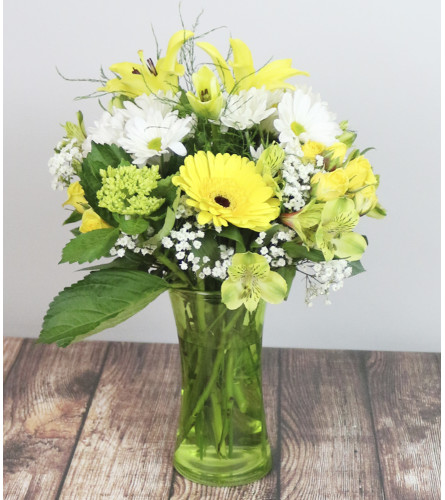 Spring Magic Bouquet. An arrangement by Rudy's Flower and Gift Shop.