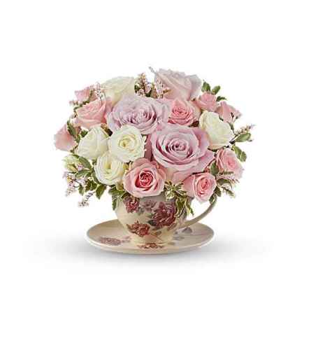 The Teleflora's Blossoming Petals Bouquet - Deluxe. An arrangement by Marivel's Florist and Gifts.