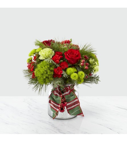 The FTD® Jingle Bells™ Bouquet - Standard. An arrangement by Royal Louis Florist.