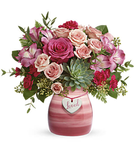 Teleflora's Cross My Heart Bouquet - Deluxe. An arrangement by Marivel's Florist and Gifts.