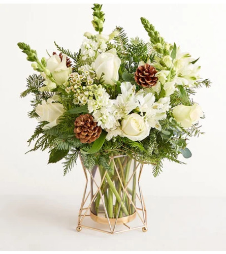 Wintersong™ - Deluxe. An arrangement by Flowers of Jacksonville.