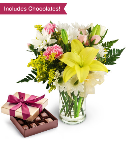 Sweet Pretty Petals Bundle - Standard. An arrangement by Lily Pad Florist. Gift bundle contains flower arrangement of Asiatic lilies, pink spray...