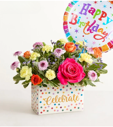 The Celebrate The Day Flower Bouquet™ With Balloon - Standard. An arrangement by Flowers of Jacksonville.