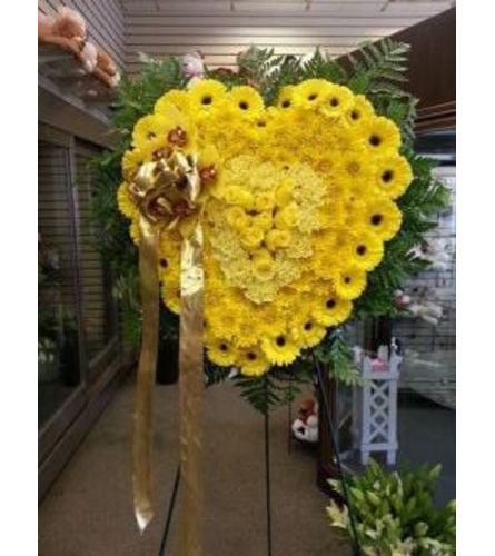 GOLDEN HEART. An arrangement by Lezze Flowers Wallington.