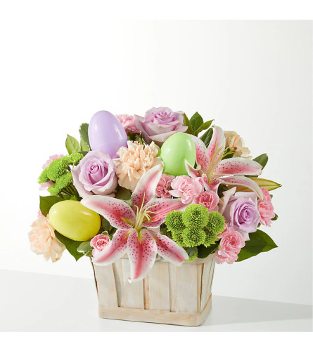 A Eggcellent Blooms Basket - Deluxe. An arrangement by Honie Rose Design.