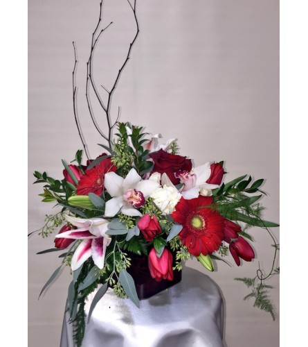 Lavish Orchid Bouquet. An arrangement by Clark's House of Flowers.