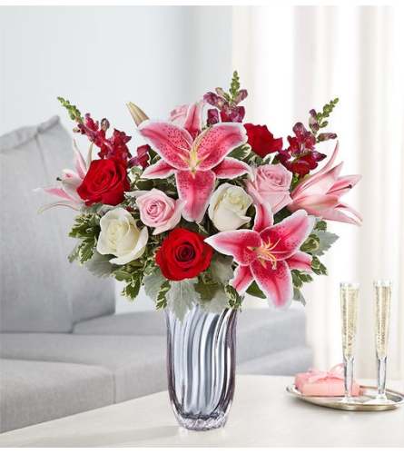 Radiant Devotion - Standard. An arrangement by Sicola's Florist.