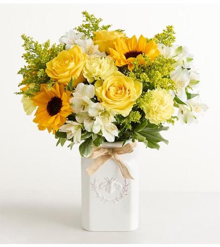 The Honey Bee Buzz™ for Summer - Deluxe. An arrangement by Susana's Flowers.