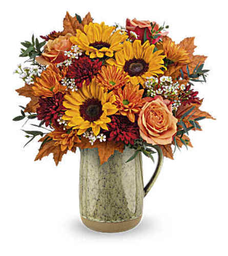 The Teleflora's Harvest Season Bouquet - Deluxe. An arrangement by Marivel's Florist and Gifts.