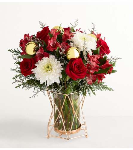 Christmas Popper™ - Deluxe. An arrangement by Flowers of Charlotte.