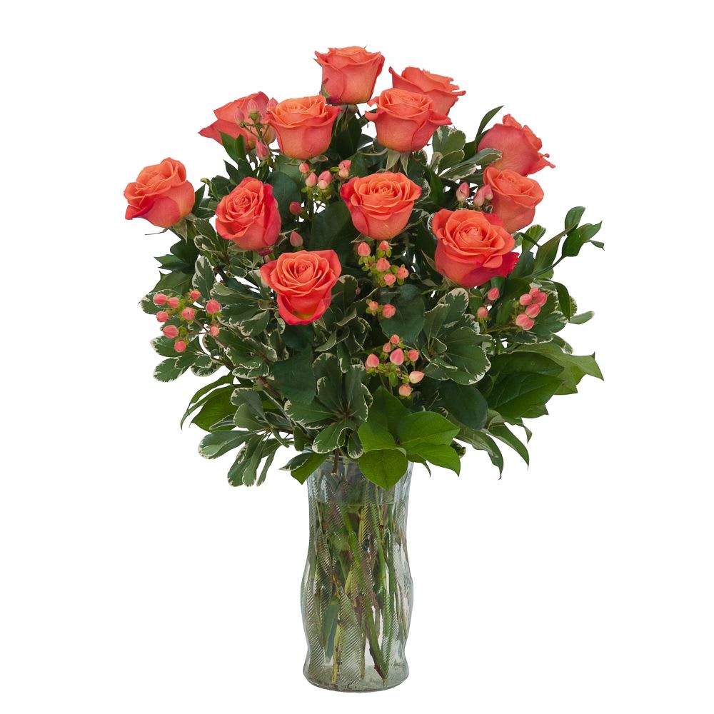 1 DOZEN ORANGE ROSES IN VASE WITH GREENS AND FILLER