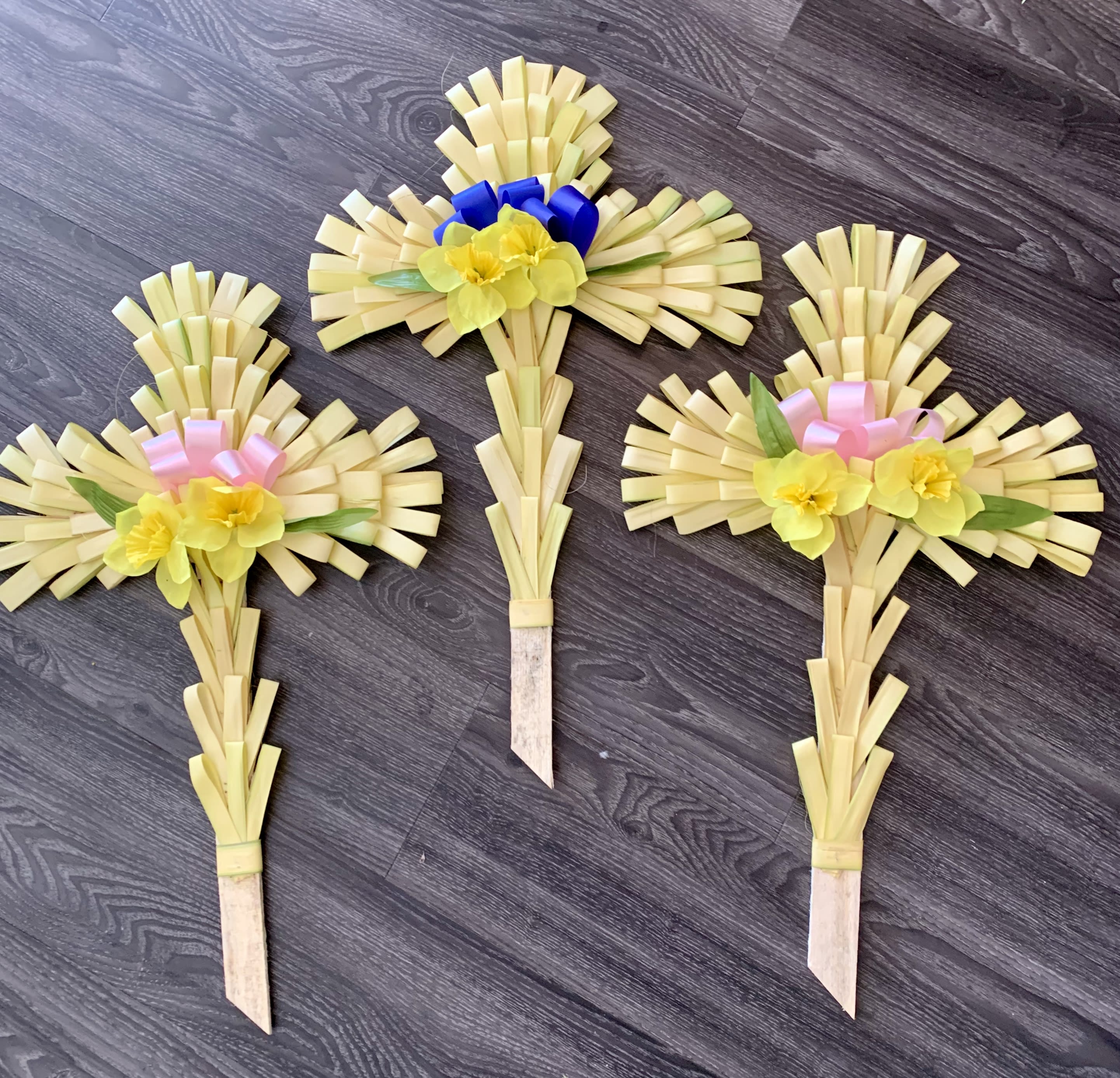 Palm Crosses Set. An arrangement by Violeta's Flower Shop.