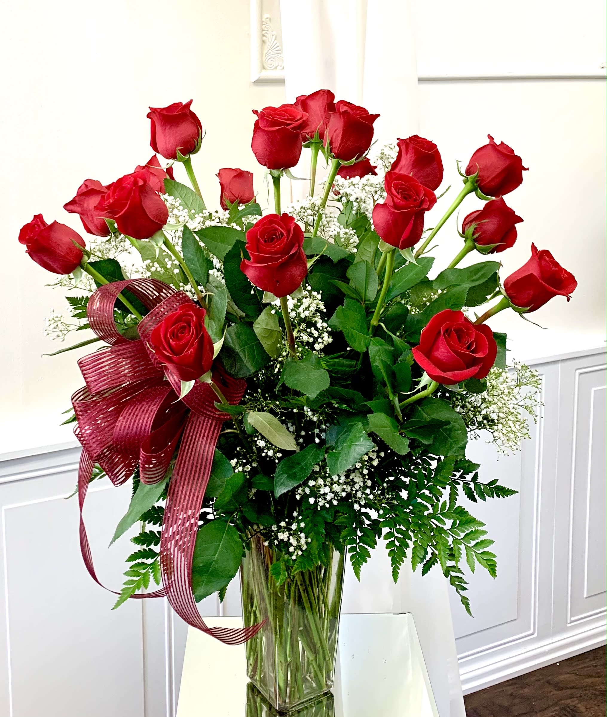 Beautiful Dozen Roses. An arrangement by Violeta's Flower Shop.