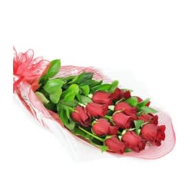 Long-Stemmed Red Roses Wrapped. An arrangement by Sueppel's Flowers.