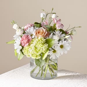 Flutter By Bqt. An arrangement by Petals and Co..