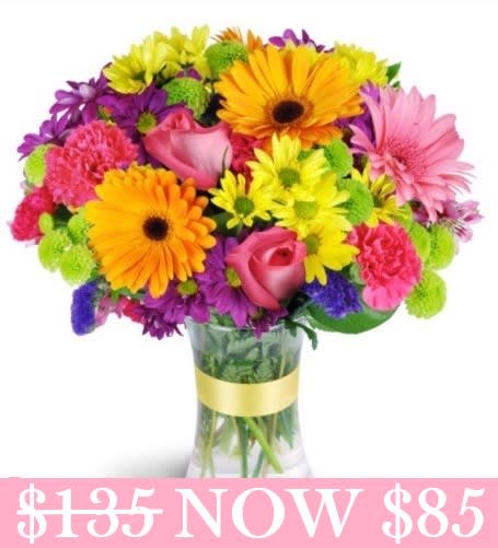 Premium Radiant Rainbow. An arrangement by Red Rose Incredible Florist.