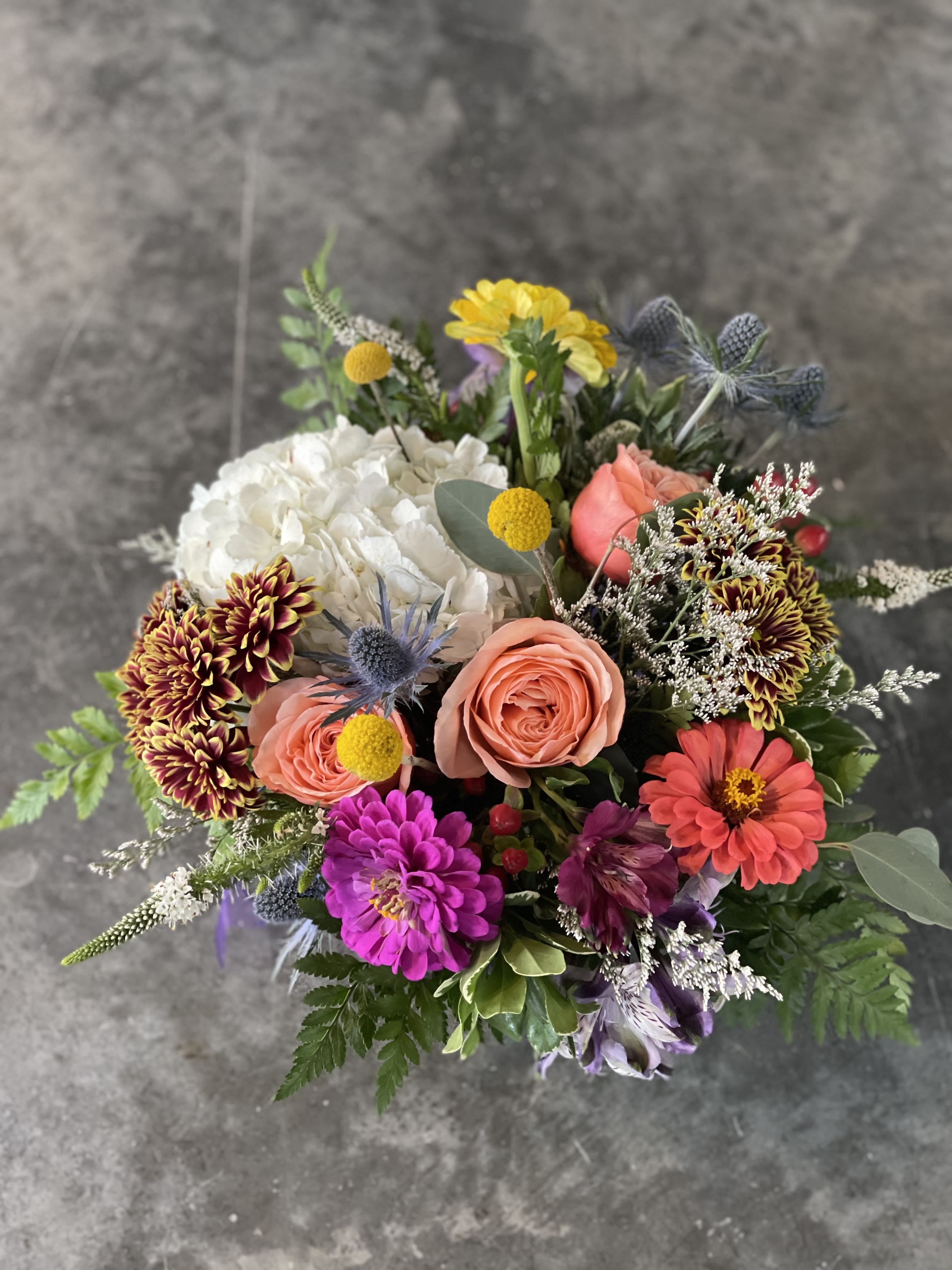 Seasonal Mixed Blooms In Vase. An arrangement by Metcalfe Florist and Pleasant View Greenhouses.
