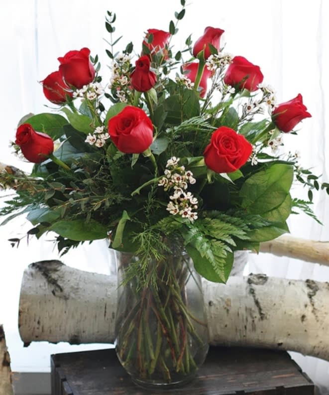 Always Loved-12 Red Roses in Vase. An arrangement by Harriet's Flower and Gift Shop.