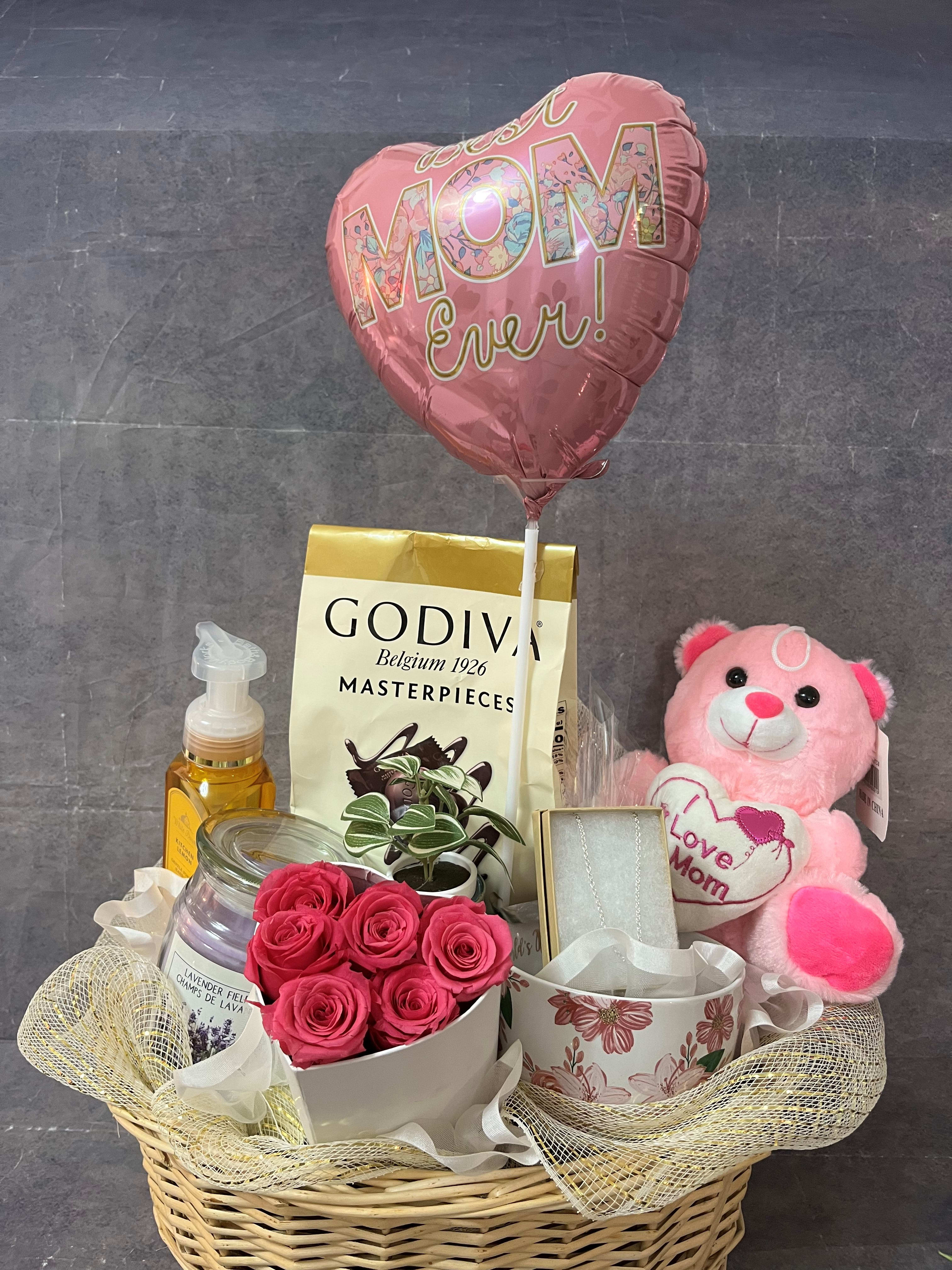 Cute Mother's Day Gift Basket. An arrangement by Sweet Blossoms.
