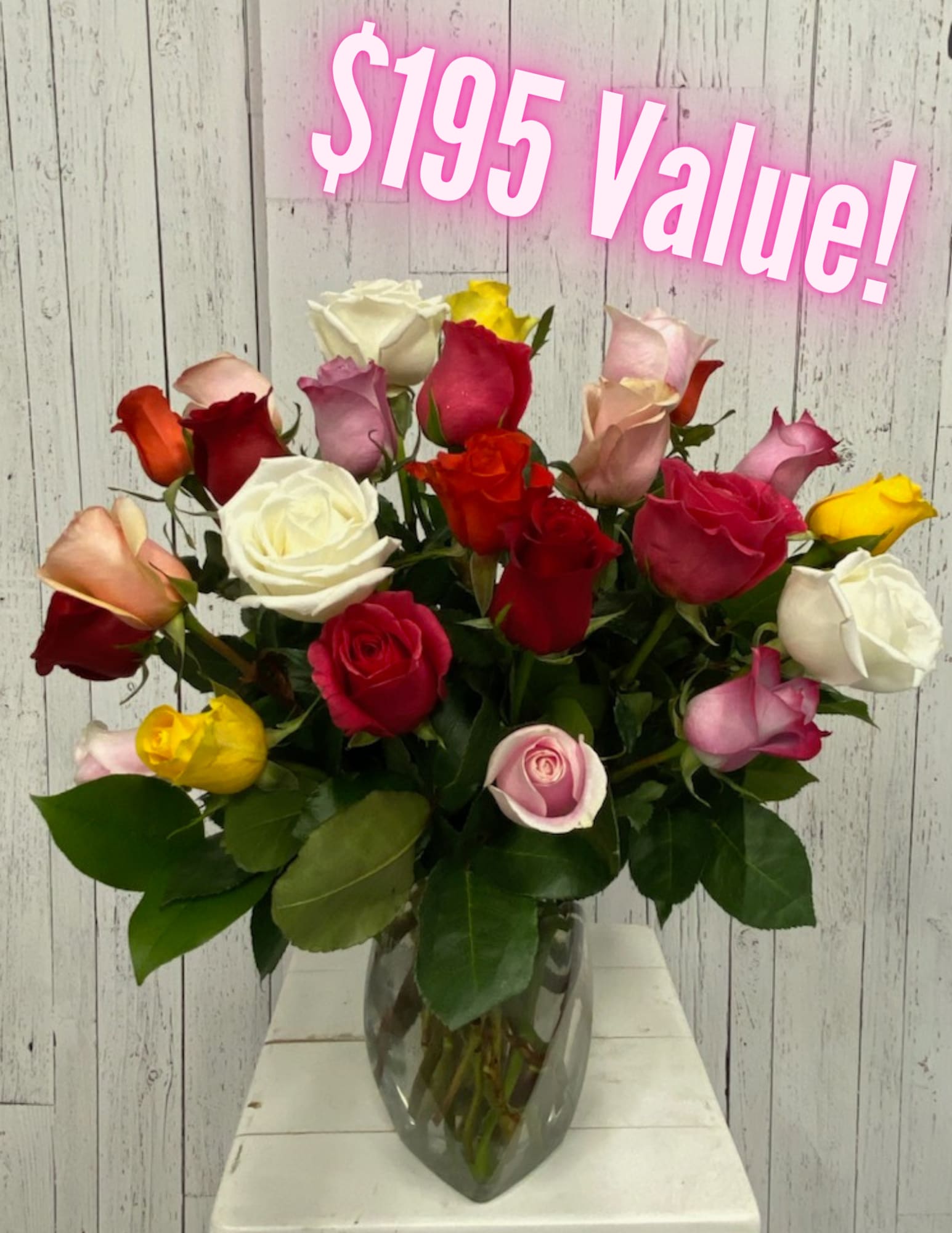 24 Premium Mixed Roses (RR). An arrangement by Red Rose Incredible Florist.