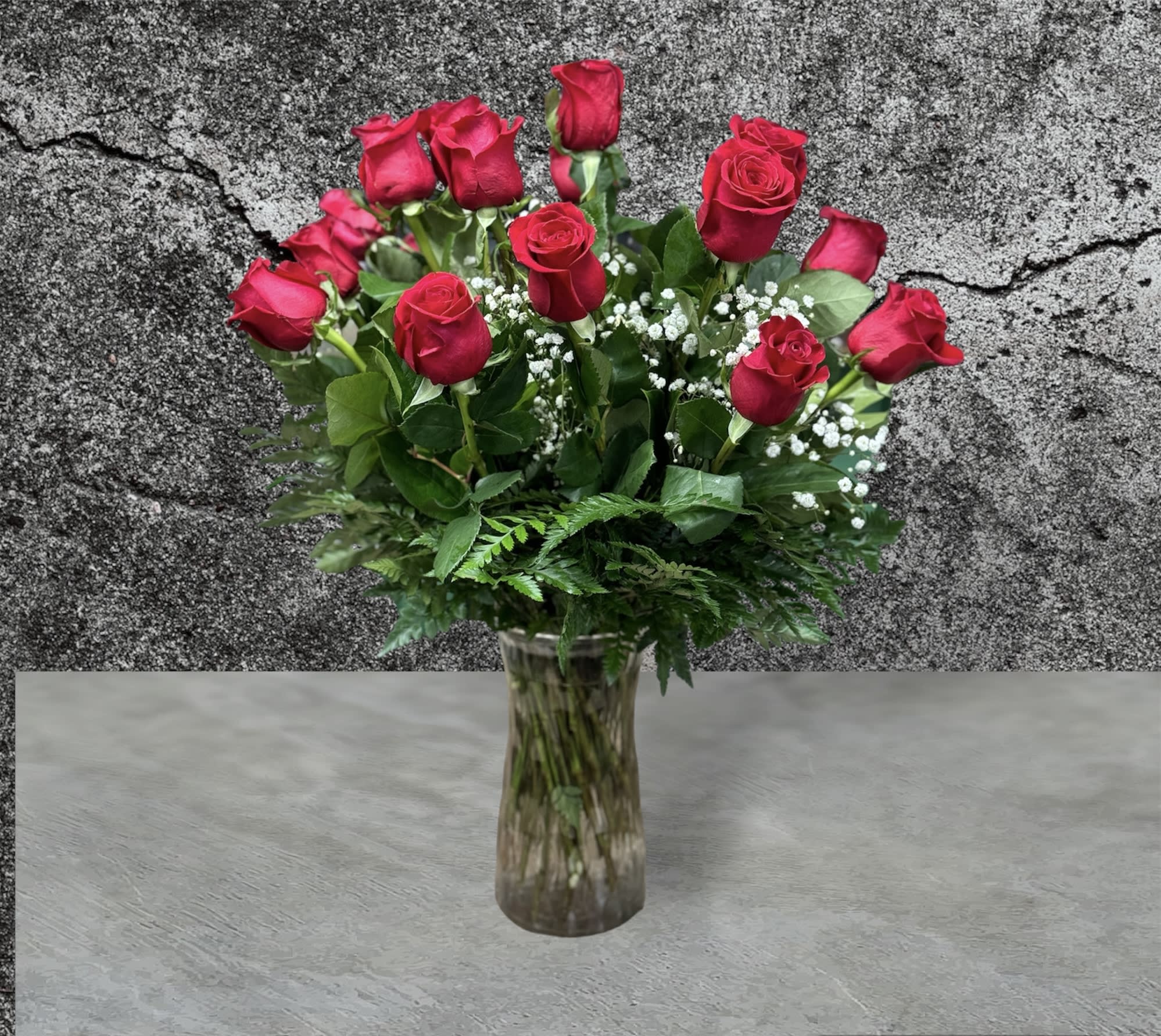 Roses Red Roses. An arrangement by Massey's House of Flowers.