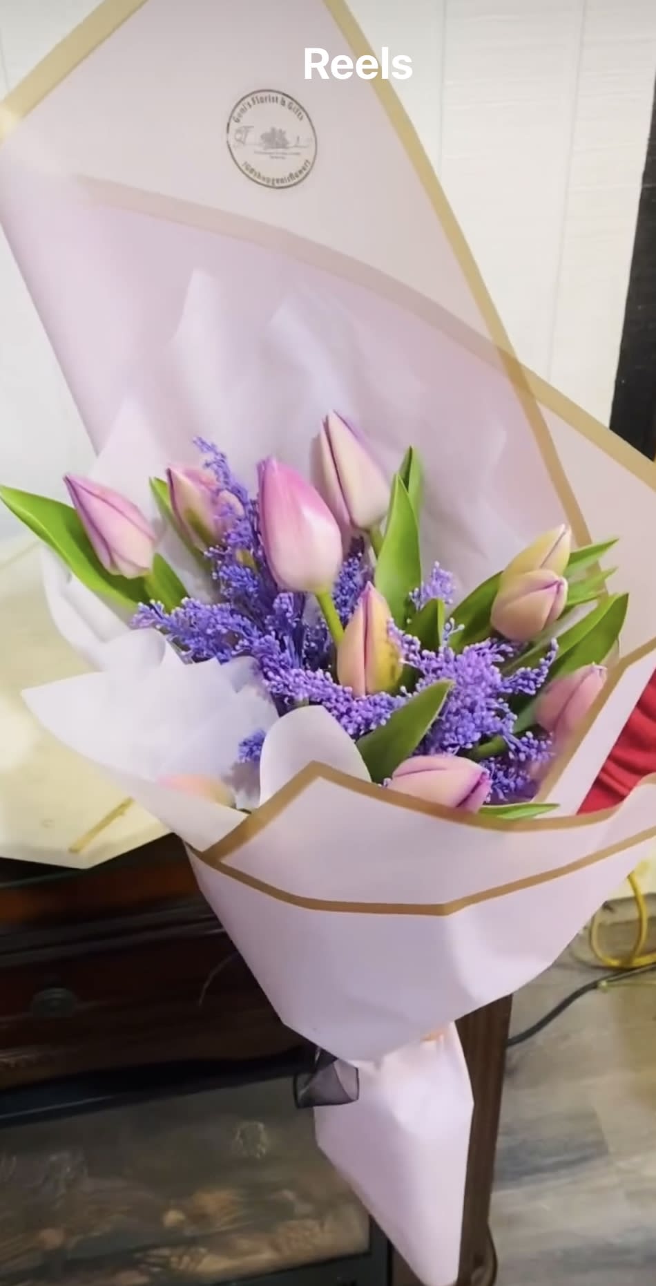 Tulips Delicacy. An arrangement by Geni's Florist and Gifts.