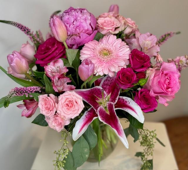 Pink and pretty!. An arrangement by Flowerville.