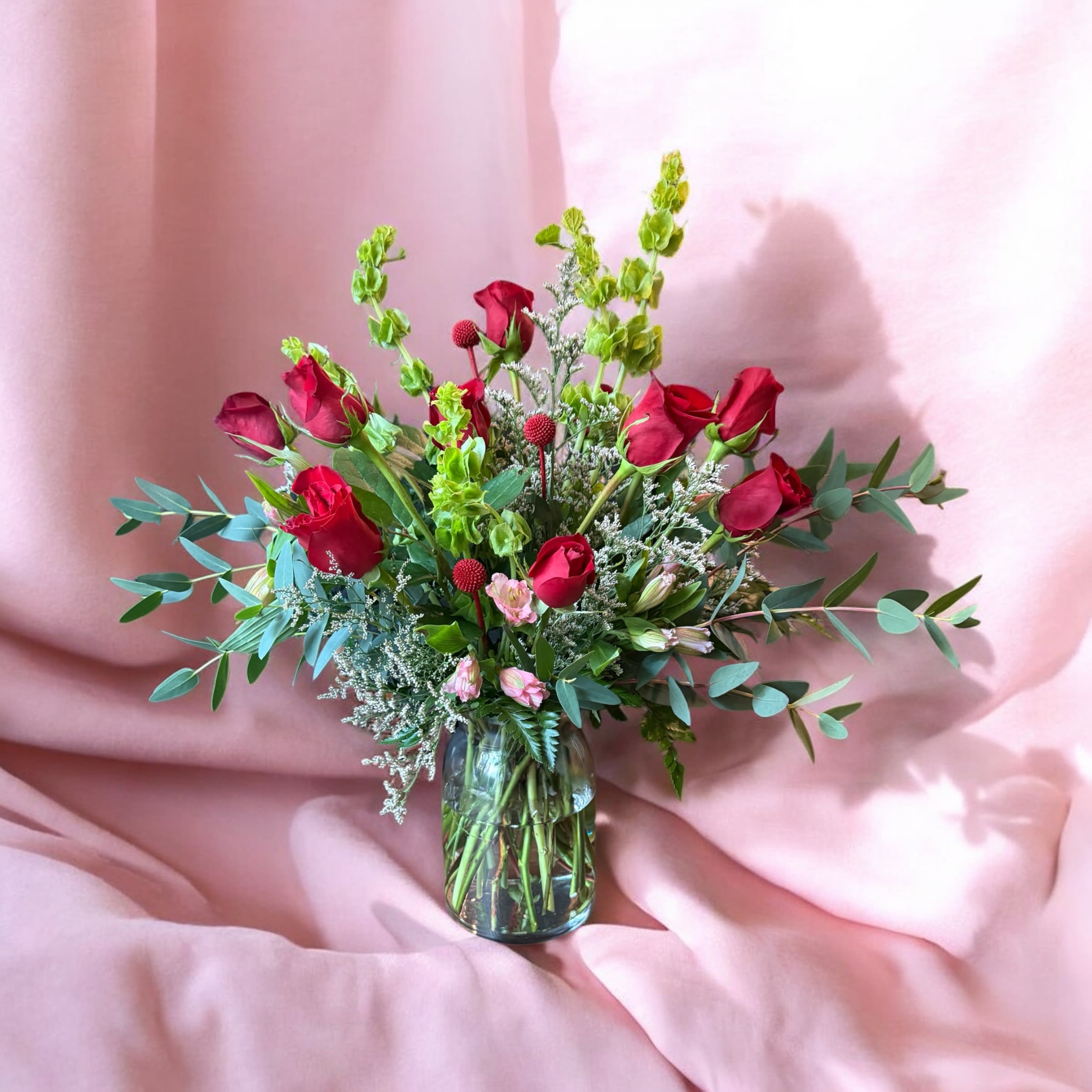 The Lady Luck Dozen. An arrangement by Vanessa's Flower Shop.