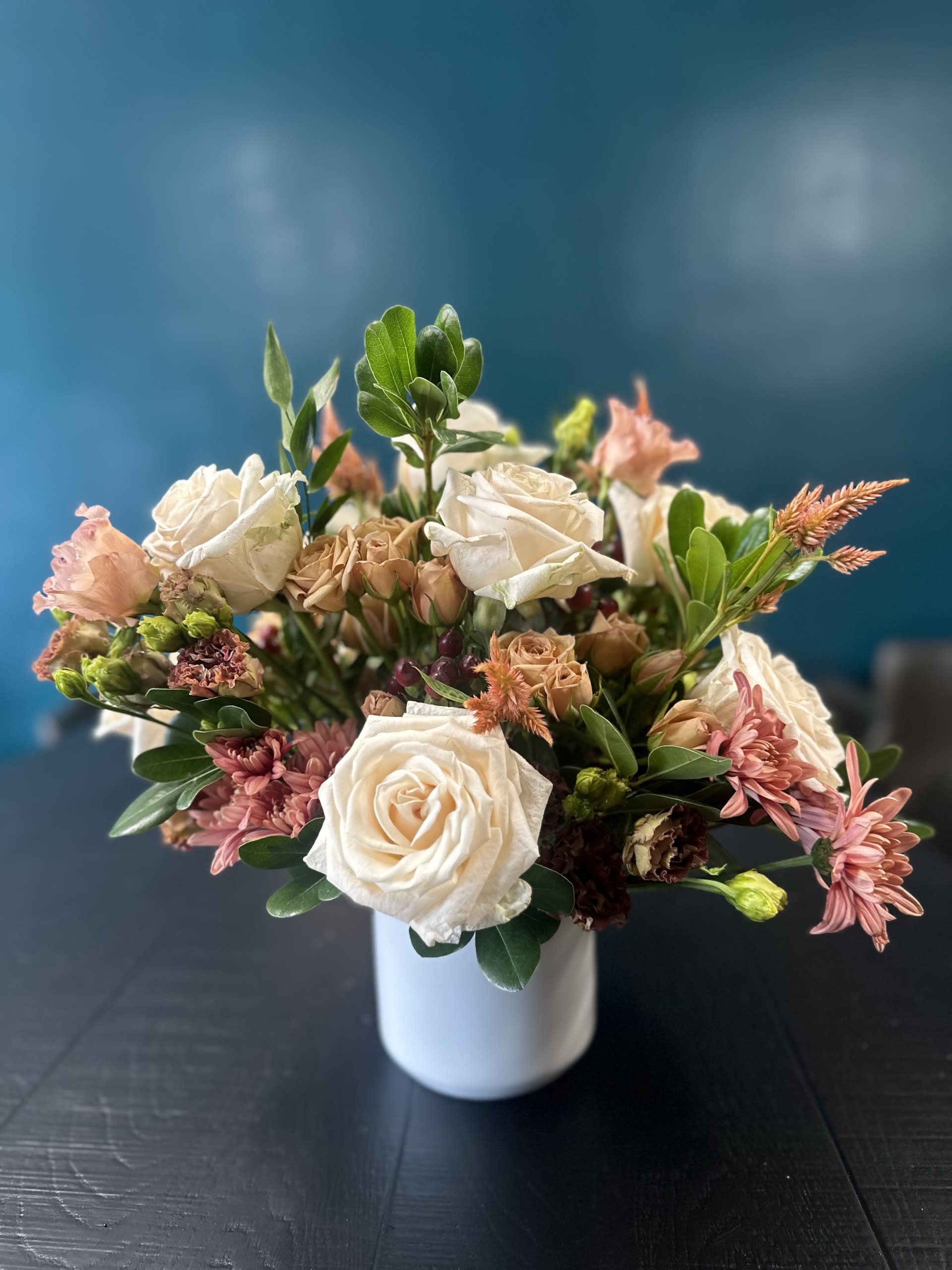 Warm Sentiments (Modern Centerpiece). An arrangement by The Floral Studio.