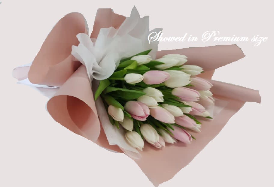 Gentle Grace Tulips. An arrangement by Geni's Florist and Gifts.