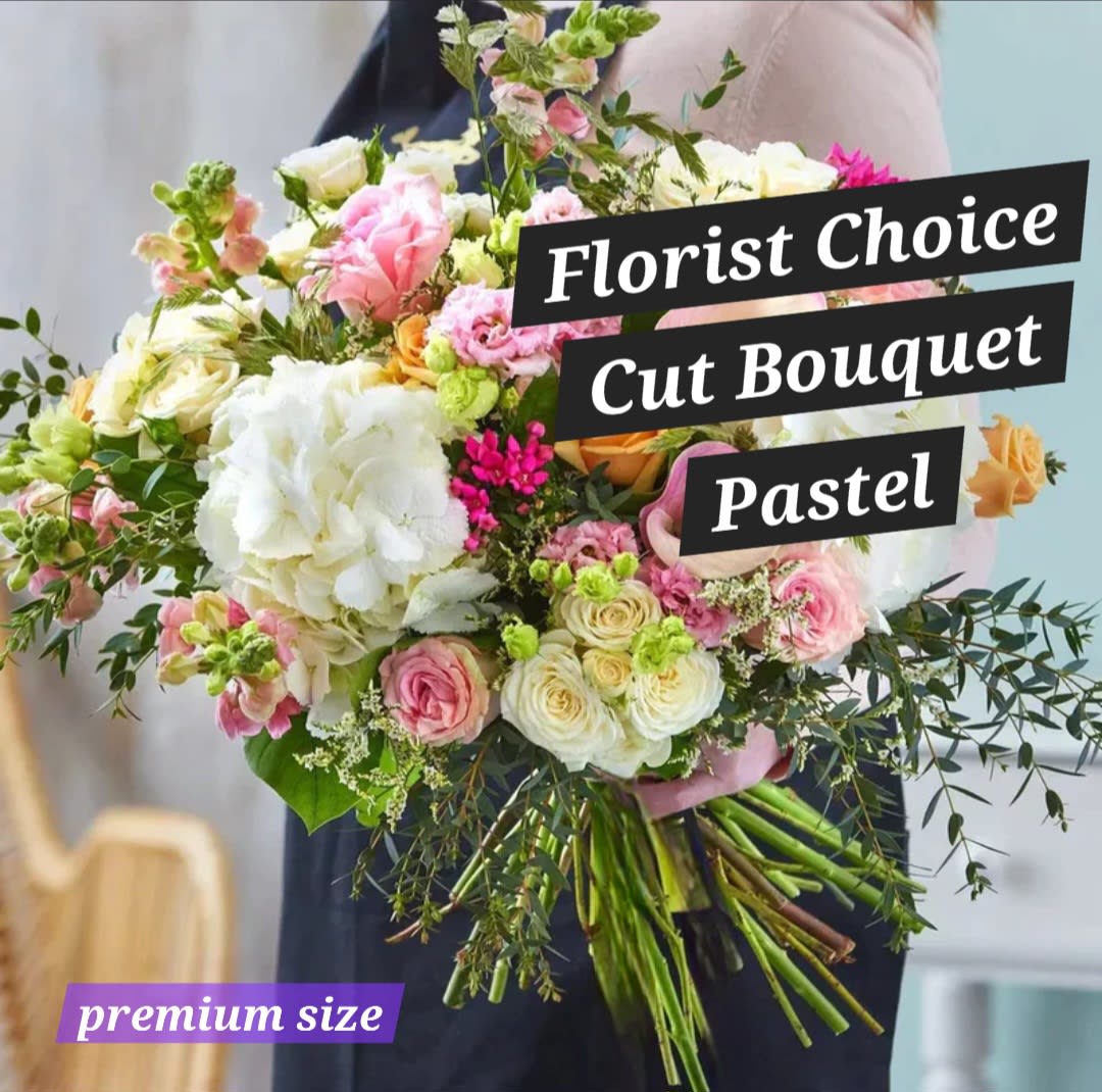 Florist Choice Pastel Cut bouquet. An arrangement by Harriet's Flower and Gift Shop.