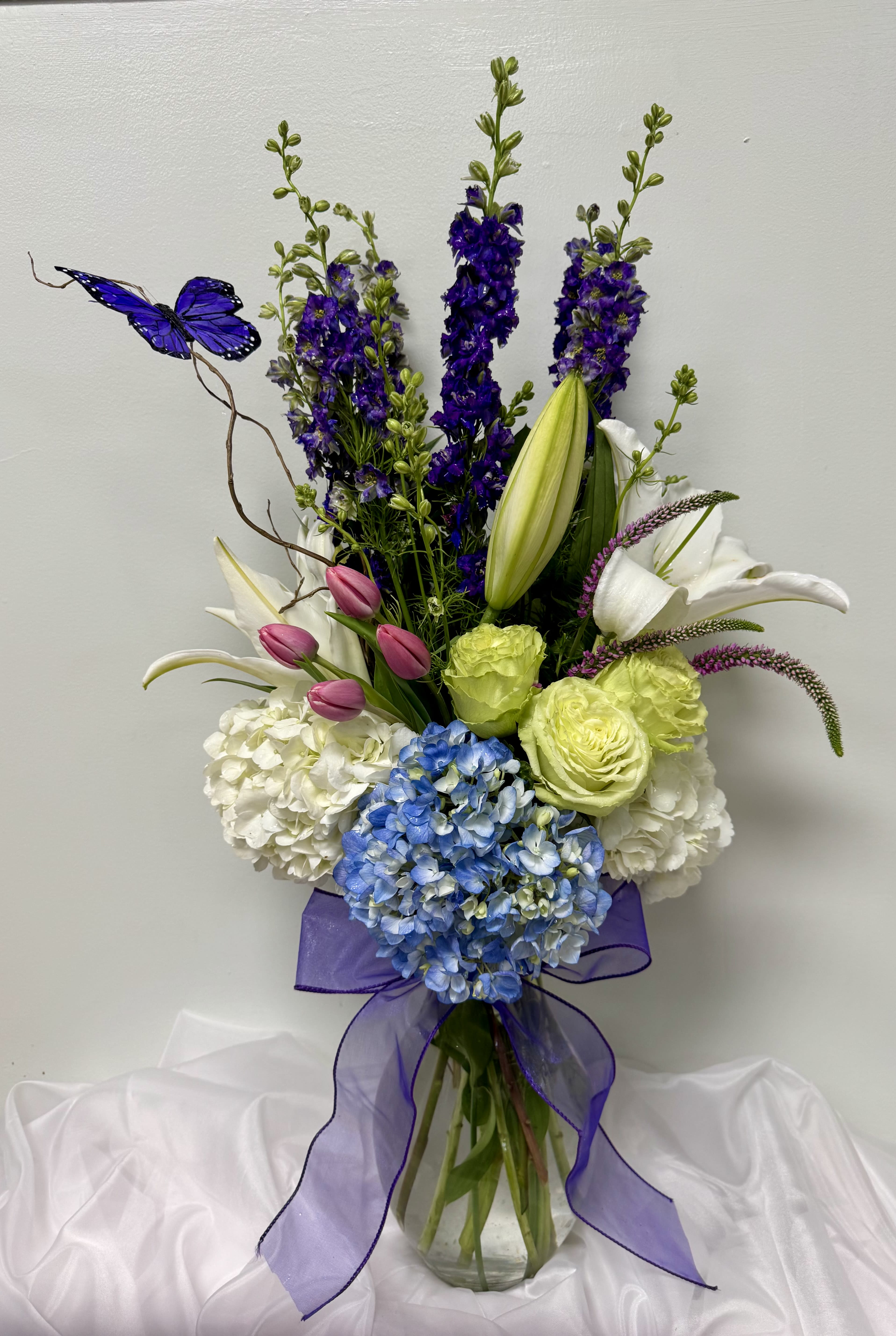 Elegant Butterfly garden. An arrangement by M's Flowers.