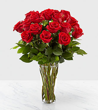 Long Stem Red Roses. An arrangement by North Liberty Flower Shop.