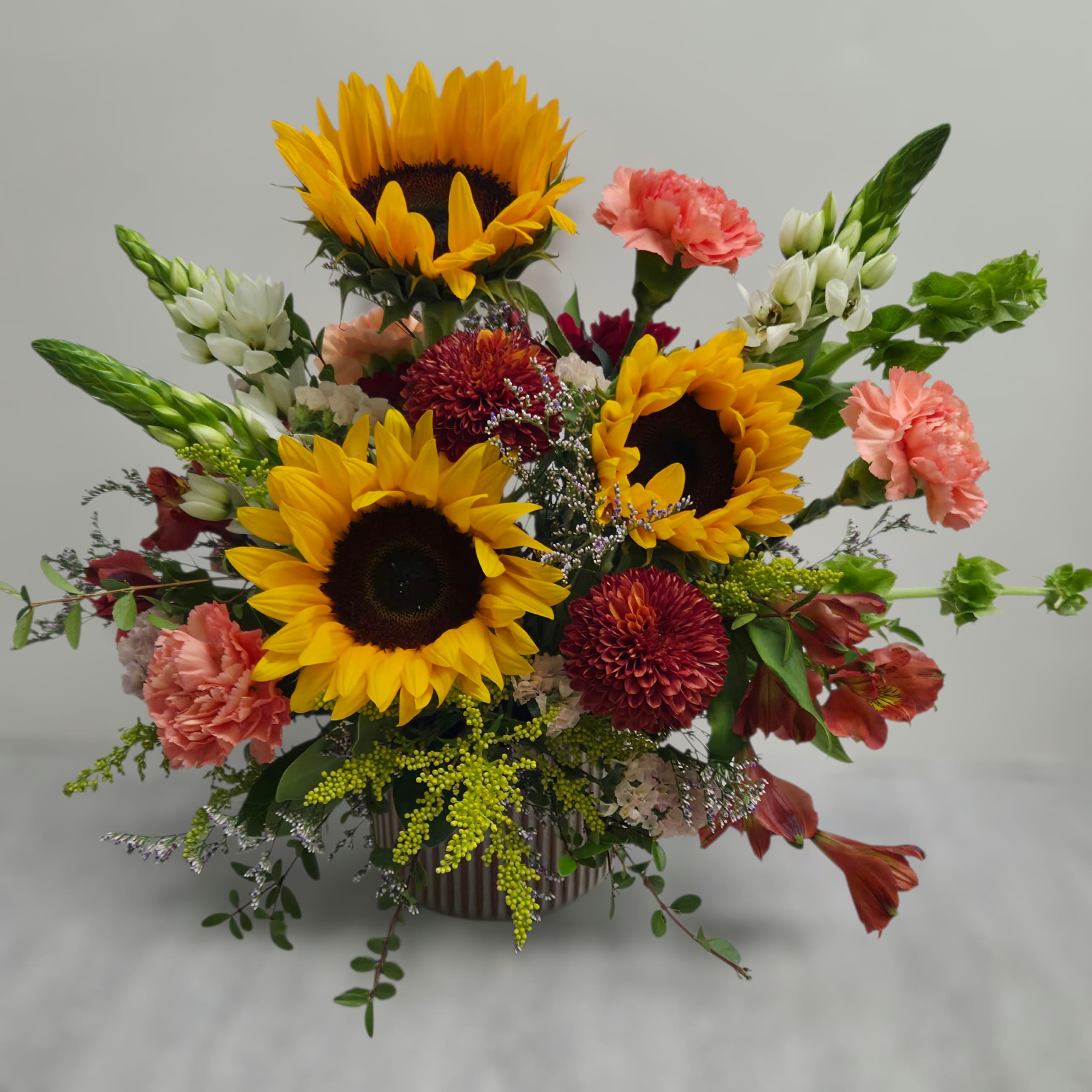 Rustic Harvest. An arrangement by Flower Trends Florists.