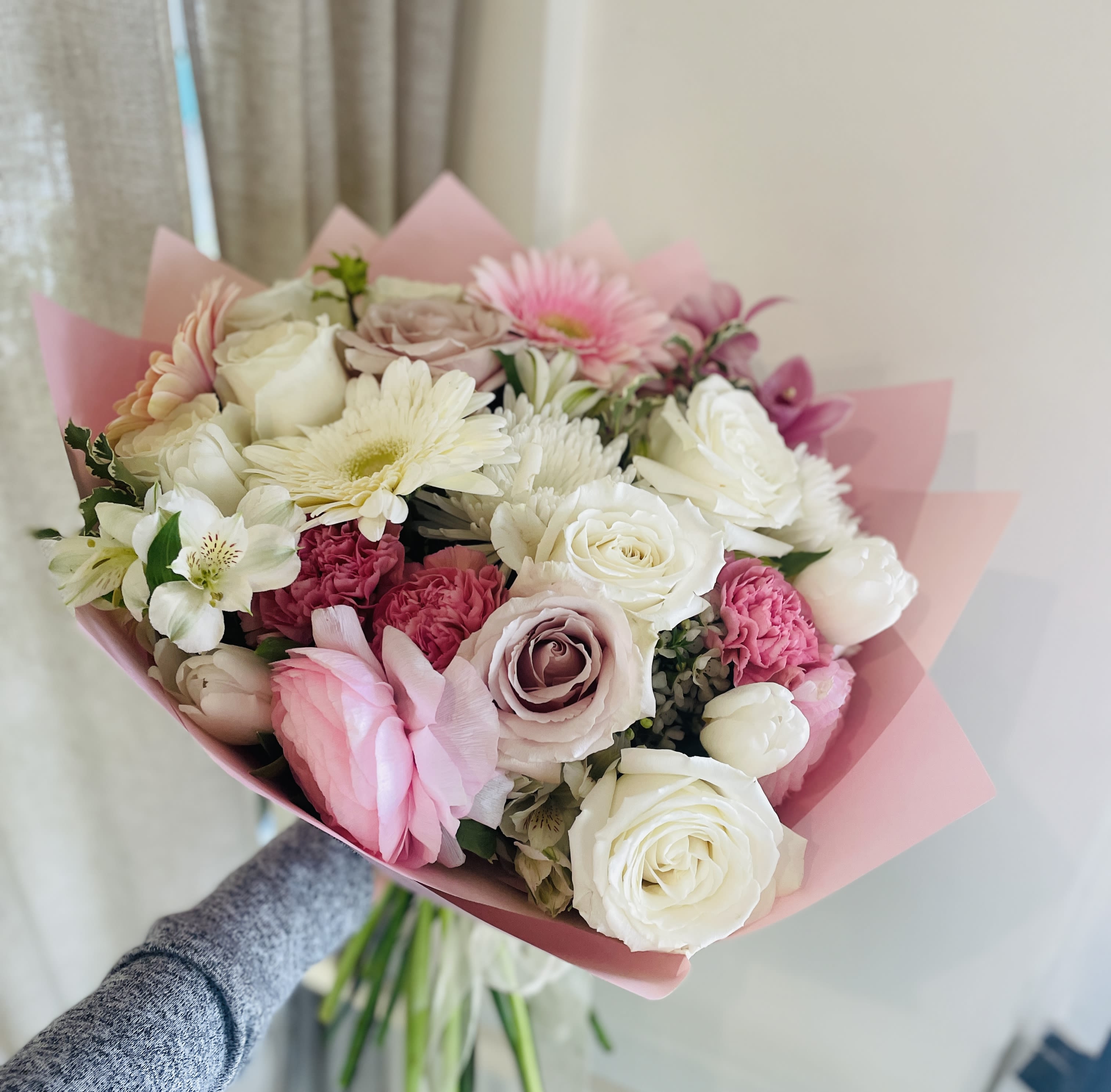 Blush Whispers Bouquet. An arrangement by Violeta's Flower Shop.