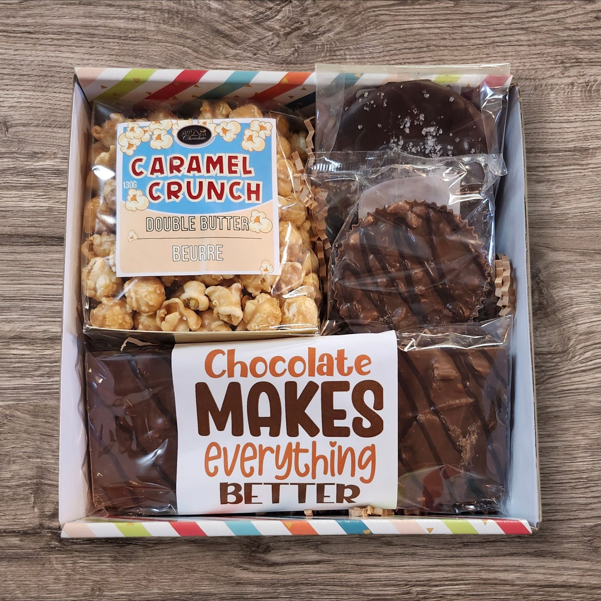 Mini Gourmet Chocolate Lovers Gift Box. An arrangement by Flowers By Design.