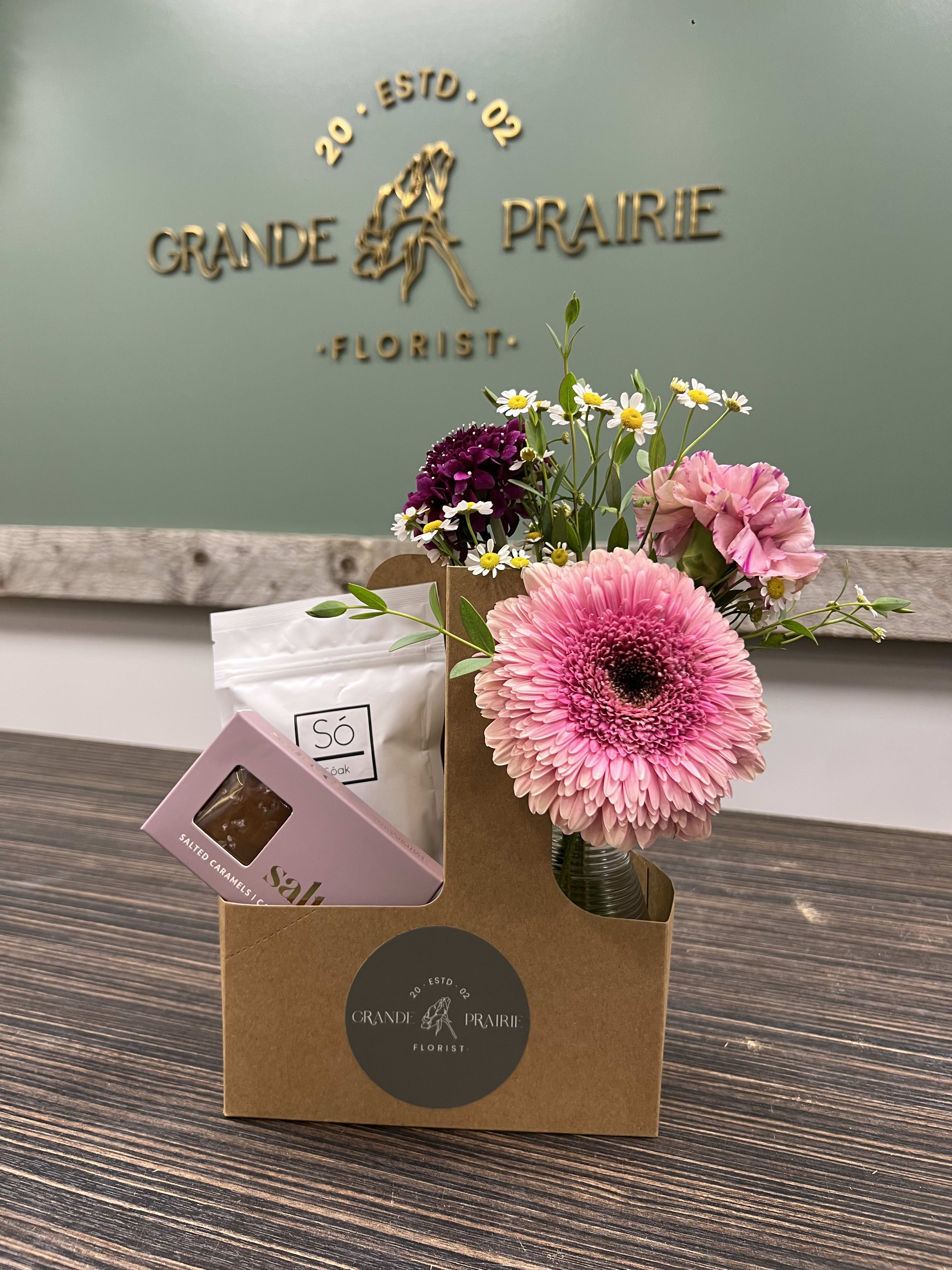 Petals and Pamper. An arrangement by Grande Prairie Florist.
