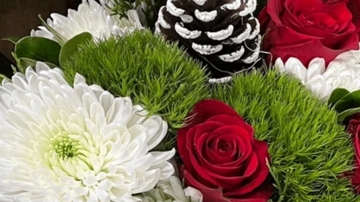 Christmas HTB - NO VASE (Photo is for Idea only). An arrangement by Deer Valley Florist and Flower Delivery.
