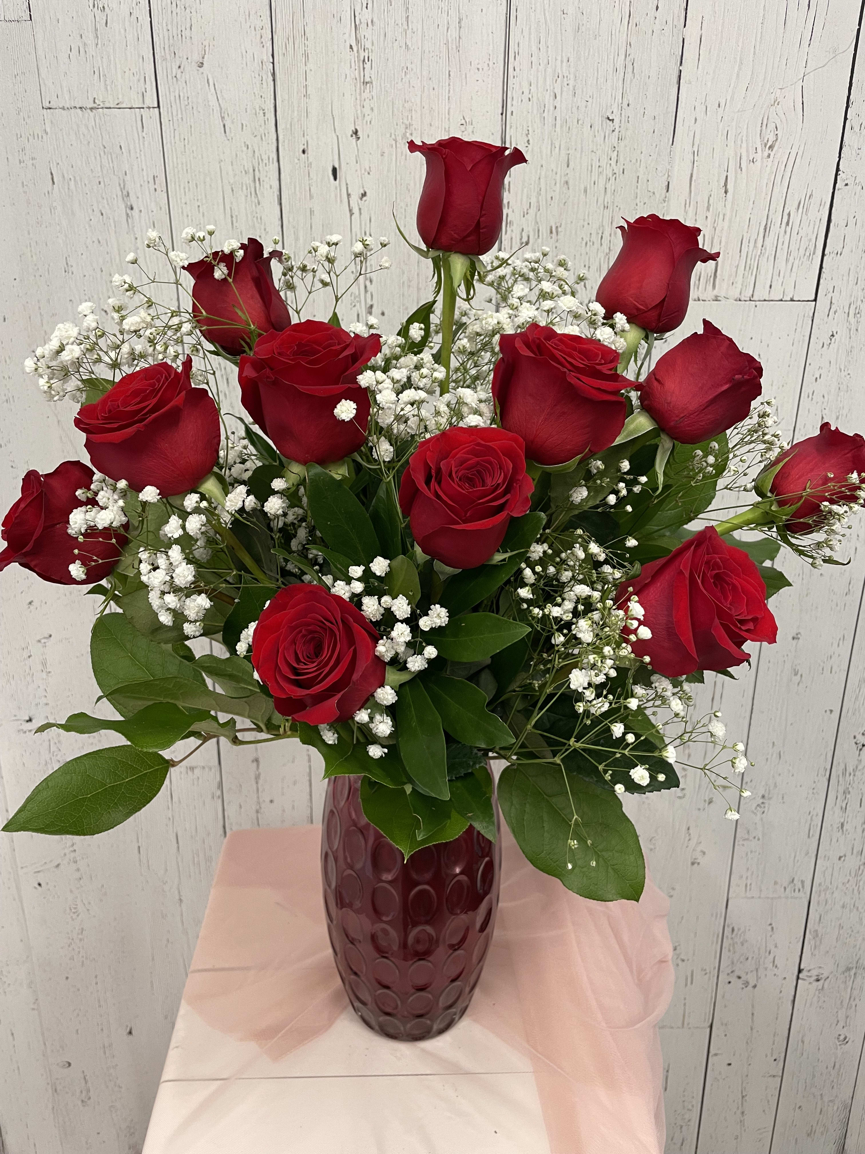 Venus (RR). An arrangement by Red Rose Incredible Florist.