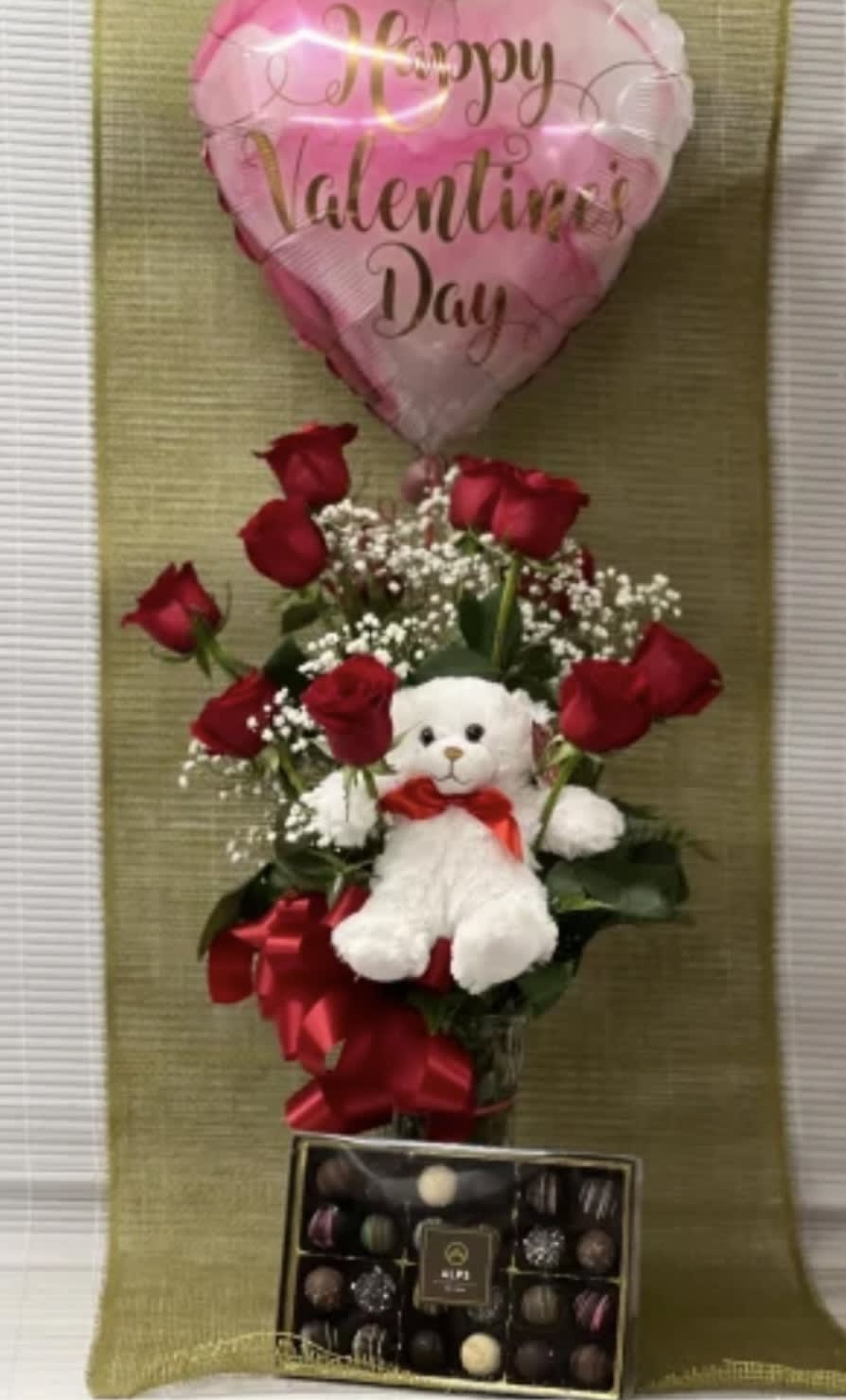 Merritts Love Bundle. An arrangement by Merritt Florist.