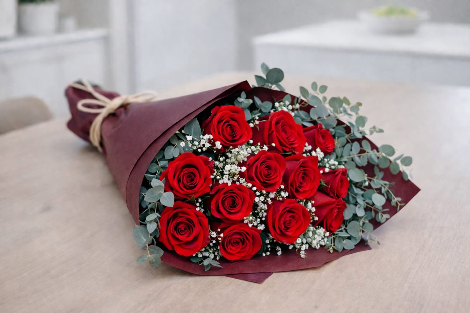 Red Roses Handtied. An arrangement by Grande Prairie Florist.