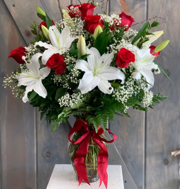 Romance in Bloom. An arrangement by The Floral Basket.