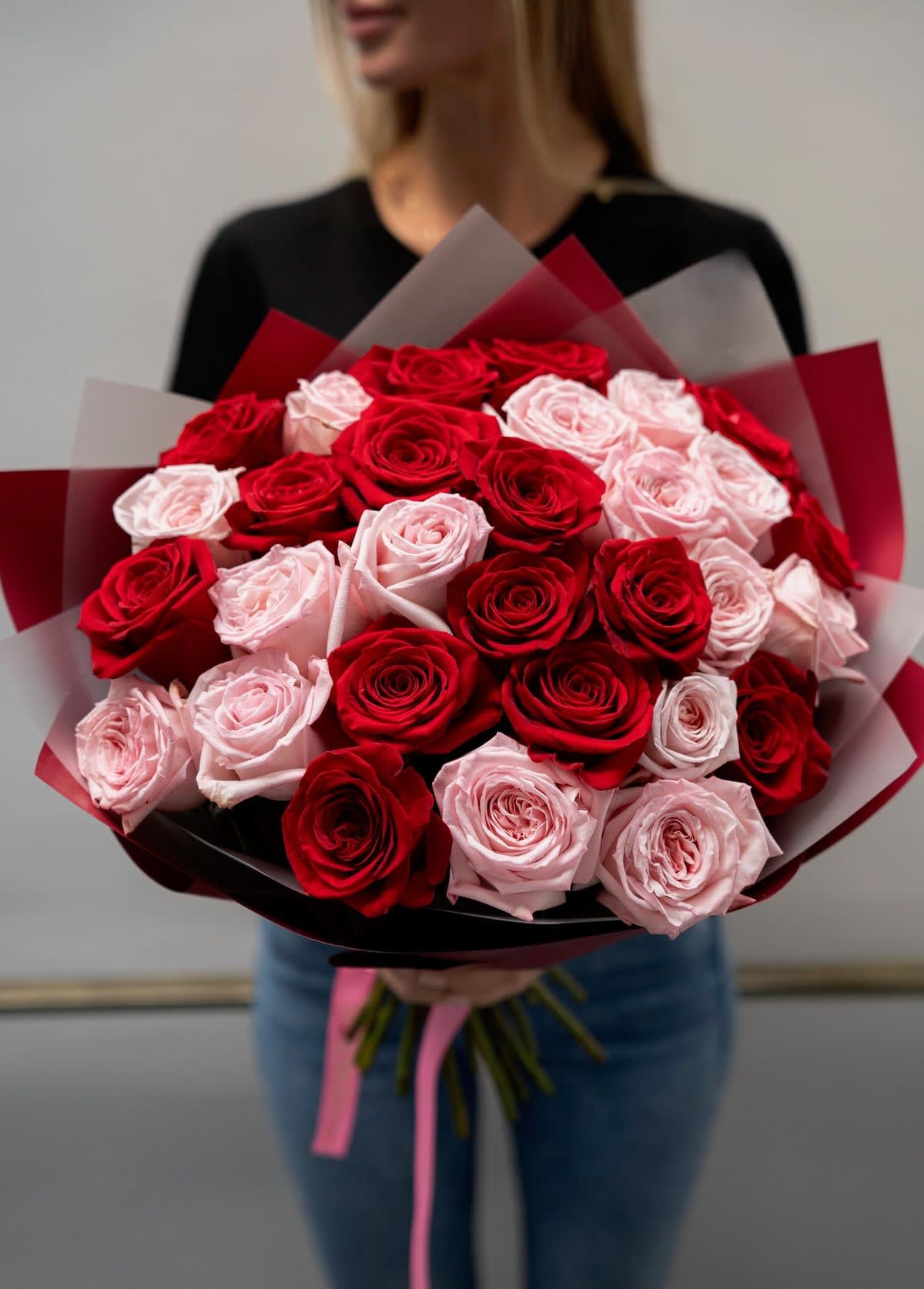 36 Red and Pink Premium Designer Wrapped Roses. An arrangement by New Britain Flower Shop.
