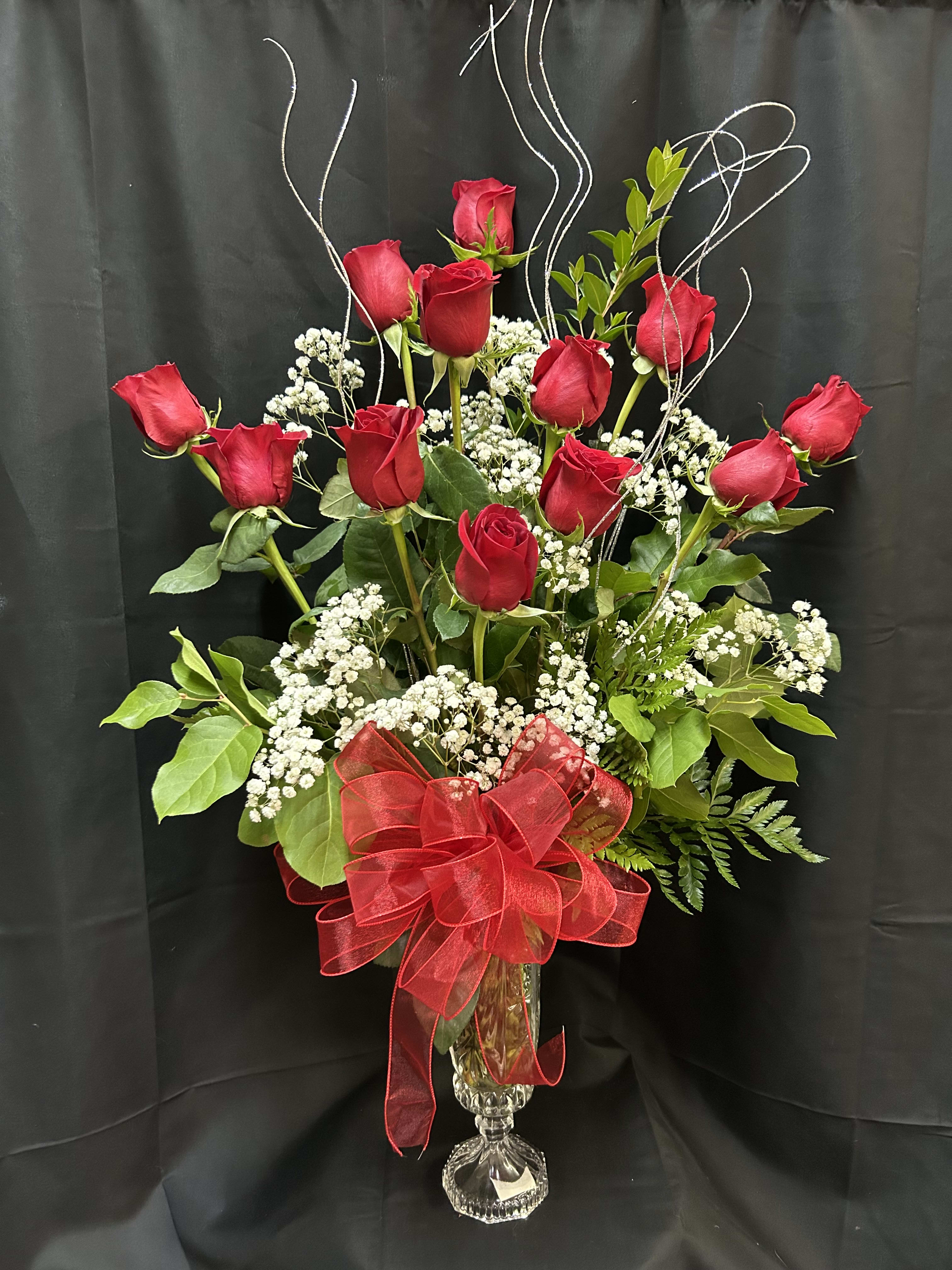 Crimson Love Elegance. An arrangement by Flowers by Neil.