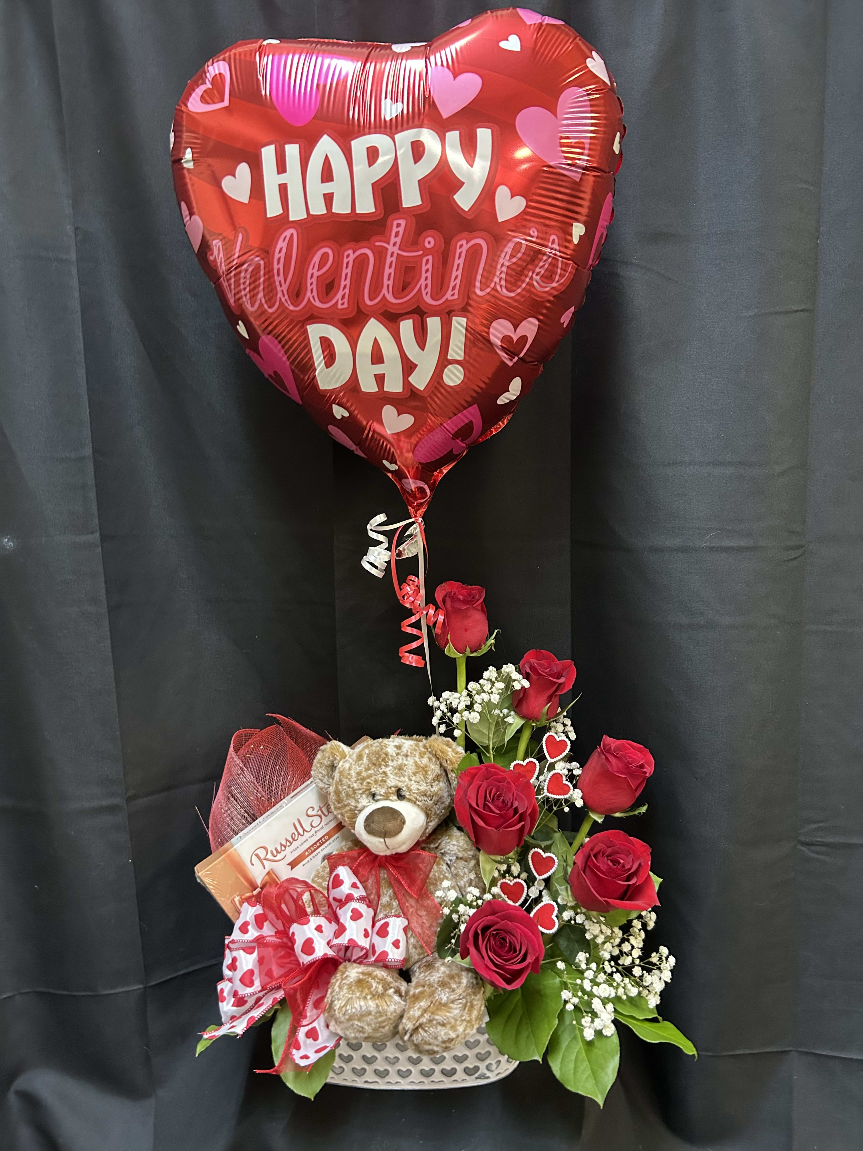 Beary Romantic Blooms. An arrangement by Flowers by Neil.