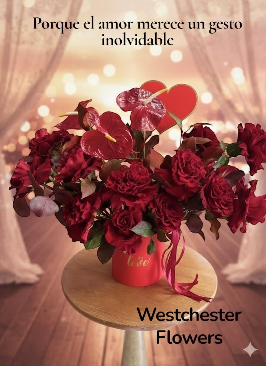 ROSES AND ANTURIOS. An arrangement by Westchester Flowers and Gifts.